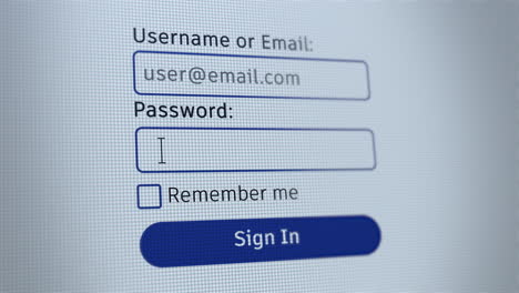 Login-on-computer-screen.-Typing-username-and-password-with-pixelated-effect